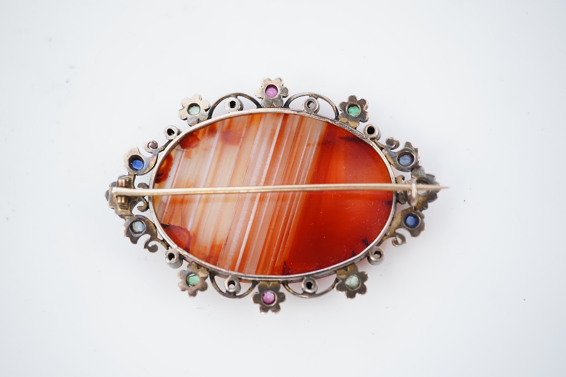 An agate, ruby, emerald and diamond brooch, circa 1900